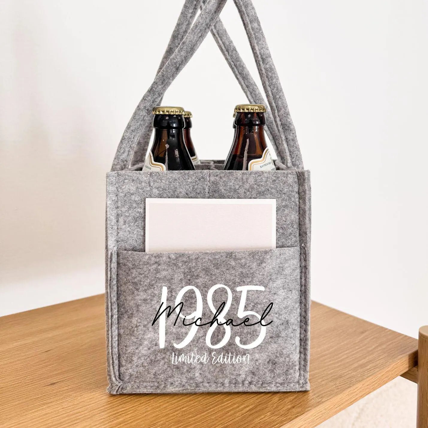 Flaschenträger · Herrenhandtasche mit Jahr