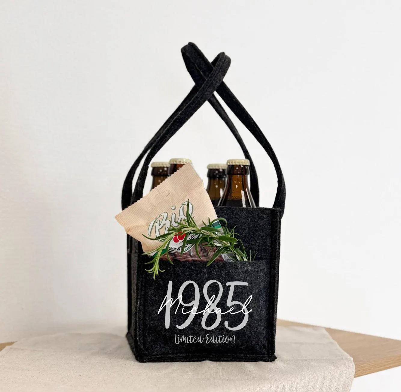 Flaschenträger · Herrenhandtasche mit Jahr